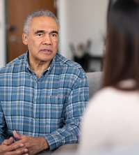 Older gentleman talking during Counseling Services in Peoria IL