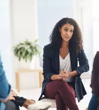 A therapist discussing issues in the home with a couple during Relationship Therapy in Peoria IL