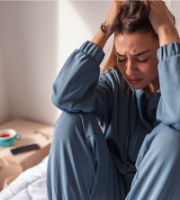 A woman contending with severe anxiety, needing Anxiety Therapy in Washington IL