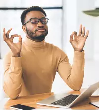 A man implementing breathing exercises to Calm Anxiety