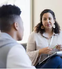 A man talking with their counselor during Depression Therapy in Dunlap IL