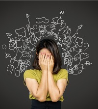 A woman with her hands in her face, feeling anxious and needing Anxiety Management in East Peoria IL