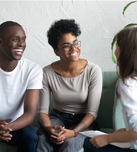 A happy couple having an excellent session of Couples Therapy in Dunlap IL