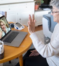 A woman talking with her counselor during Telehealth Therapy in East Peoria IL