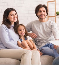 Happy family listening to therapist during Family Therapy Near You