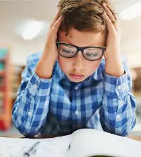 A young child having a difficult time focusing, needing ADHD Treatment in Peoria IL