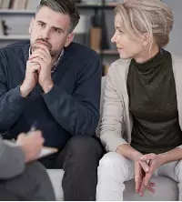 A married couple talking with a counselor during Marriage Counseling in East Peoria IL