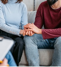 A couple discussing their relationship to Marriage Counselors in Peoria IL