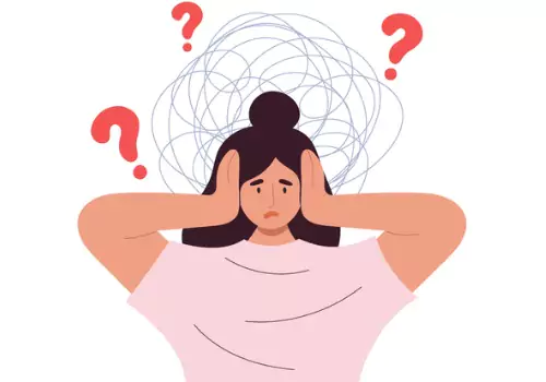 A worried woman wondering What is Causing Her Depression